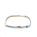 Tiffany & Co., Frank Ghery Torque 18K White Gold and Diamond Bangle Bracelet