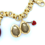Fabergé, 18K Yellow Gold and Enamel Egg Charm Bracelet