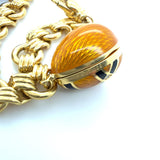 Fabergé, 18K Yellow Gold and Enamel Egg Charm Bracelet
