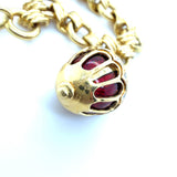 Fabergé, 18K Yellow Gold and Enamel Egg Charm Bracelet