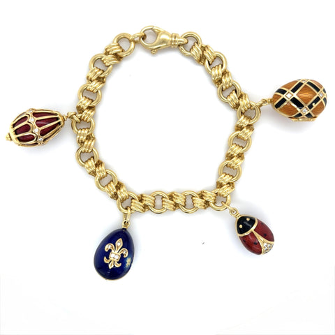 Fabergé, 18K Yellow Gold and Enamel Egg Charm Bracelet